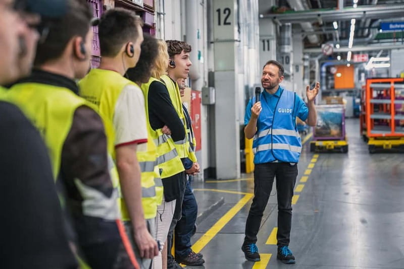 Berlin: BMW Motorrad Production – See How Bikes Are Built - The intelligent C-hook system you’ll notice on the floor