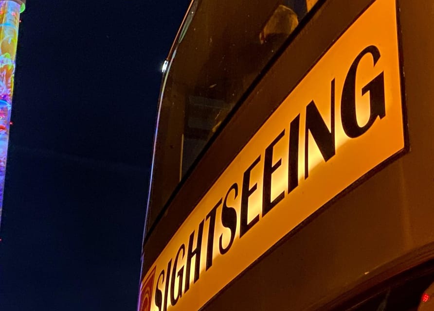 Berlin: Bus Tour by Night with Live Commentary - Potsdamer Platz and Friedrichstraße: where the projections feel cinematic