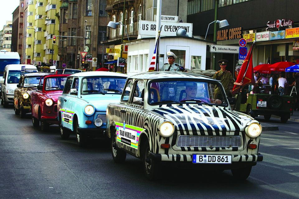 Berlin: The Wall Ride Guided Trabi Tour - Checkpoint Charlie: hearing the border story while crossing the area