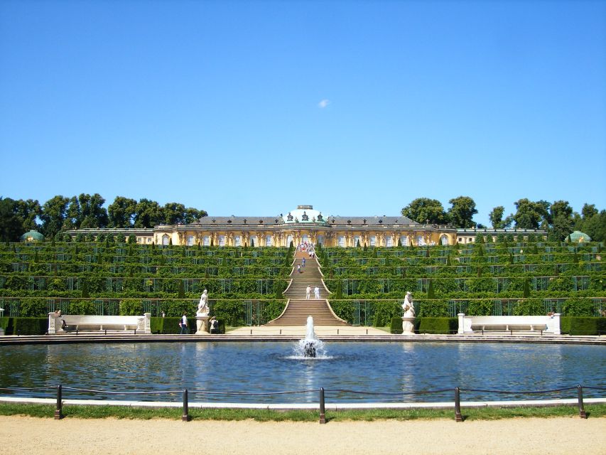 From Berlin: Potsdam Half-Day Tour in Spanish - Sanssouci Palace Exterior and the Park-and-Gardens Experience